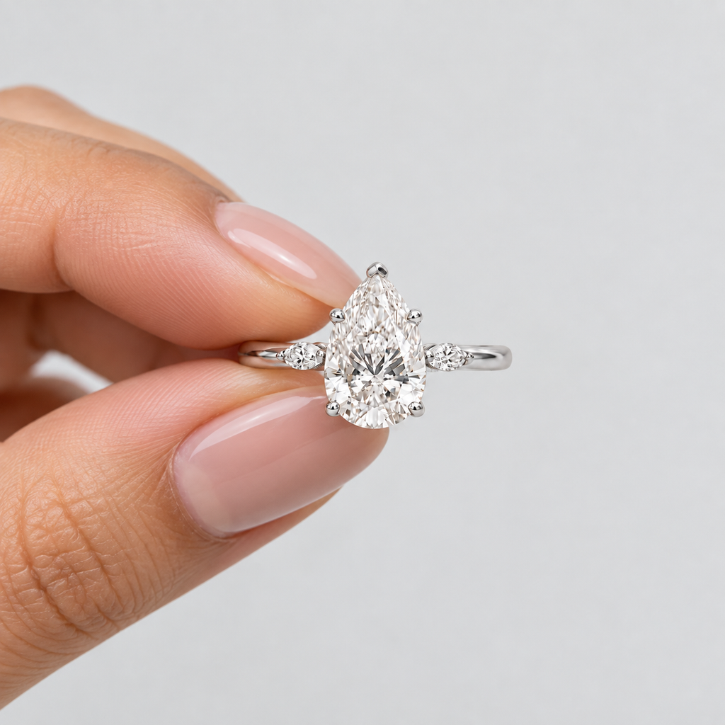 3.10 Ct. Lab Grown Diamond Pear & Marquise Three Stone Ring (VS-EF)