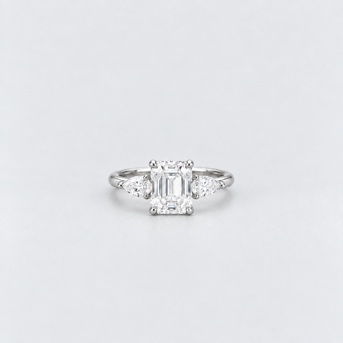1.90 Ct. Lab Grown Diamond Emerald & Pear Three Stone Ring (VS-EF)