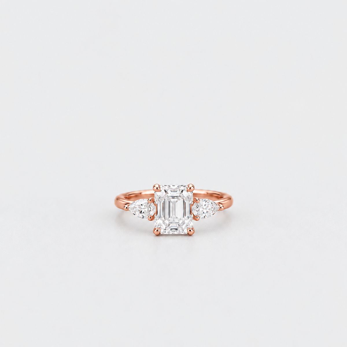 1.90 Ct. Lab Grown Diamond Emerald & Pear Three Stone Ring (VS-EF)