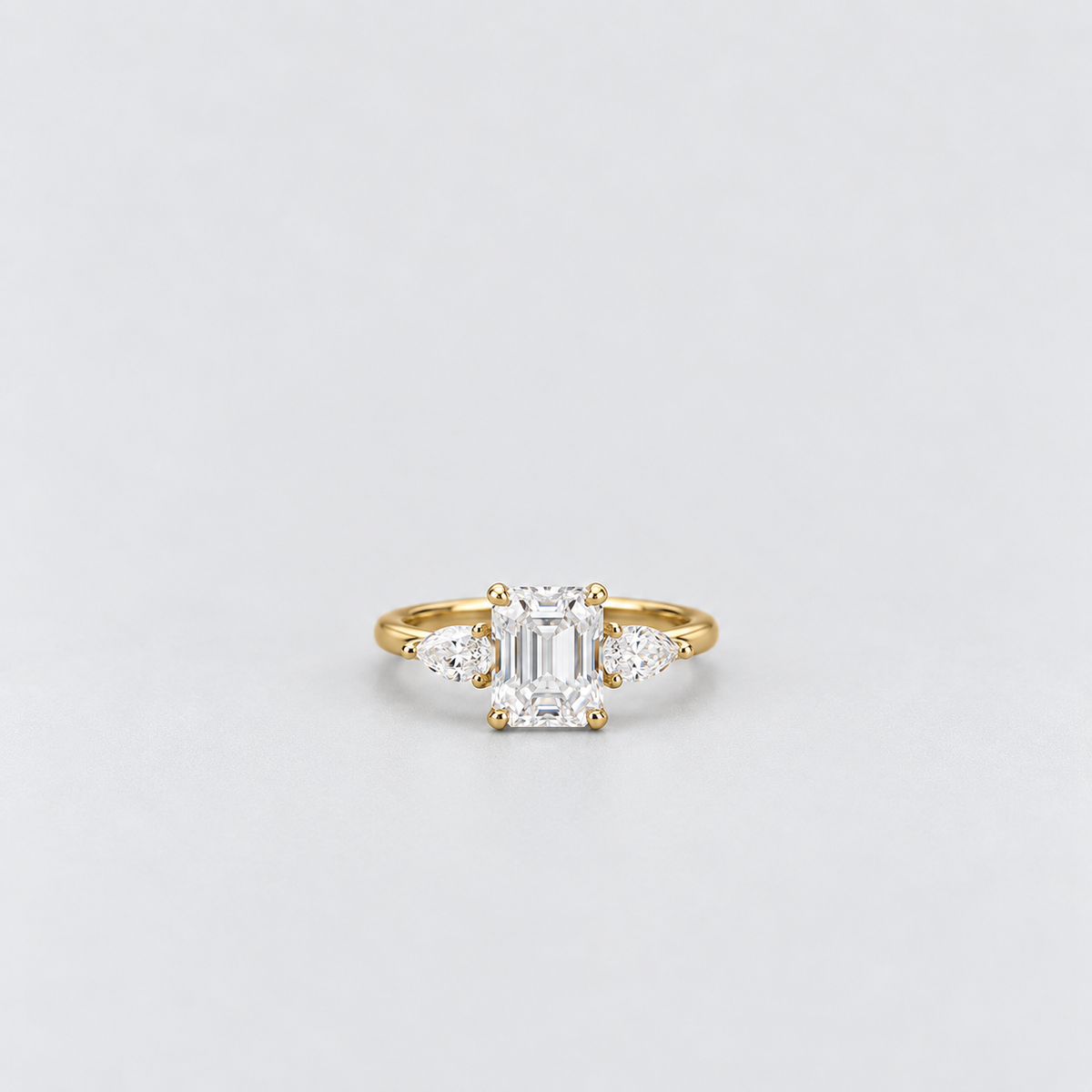 1.90 Ct. Lab Grown Diamond Emerald & Pear Three Stone Ring (VS-EF)