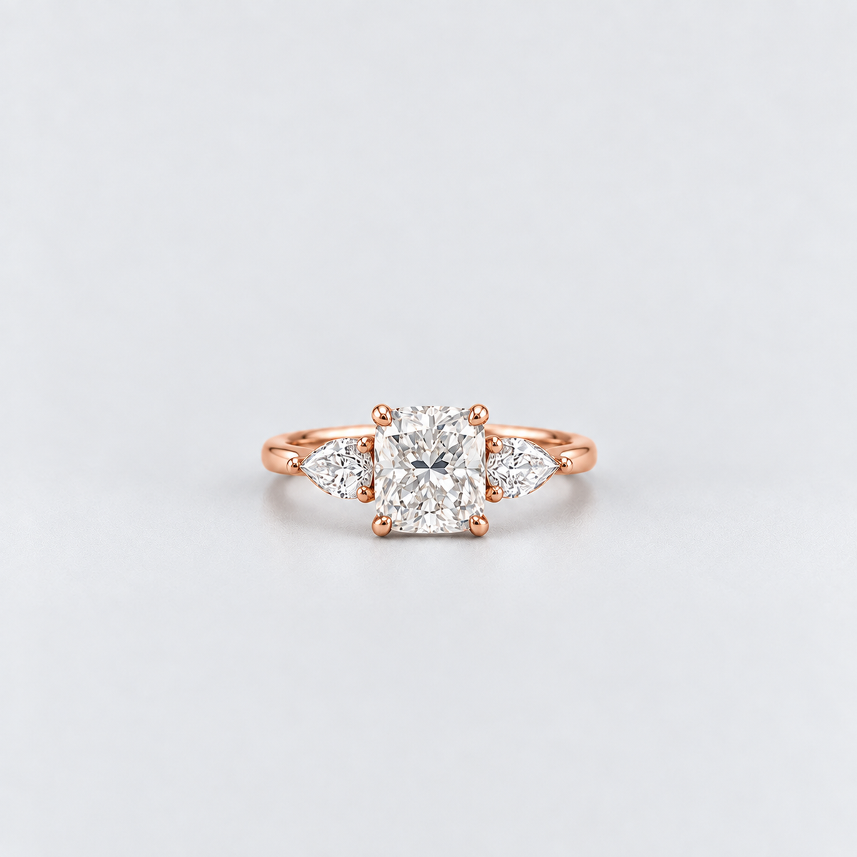 2.40 Ct. Lab Grown Diamond Cushion & Pear Cut Three Stone Ring (VS-EF)