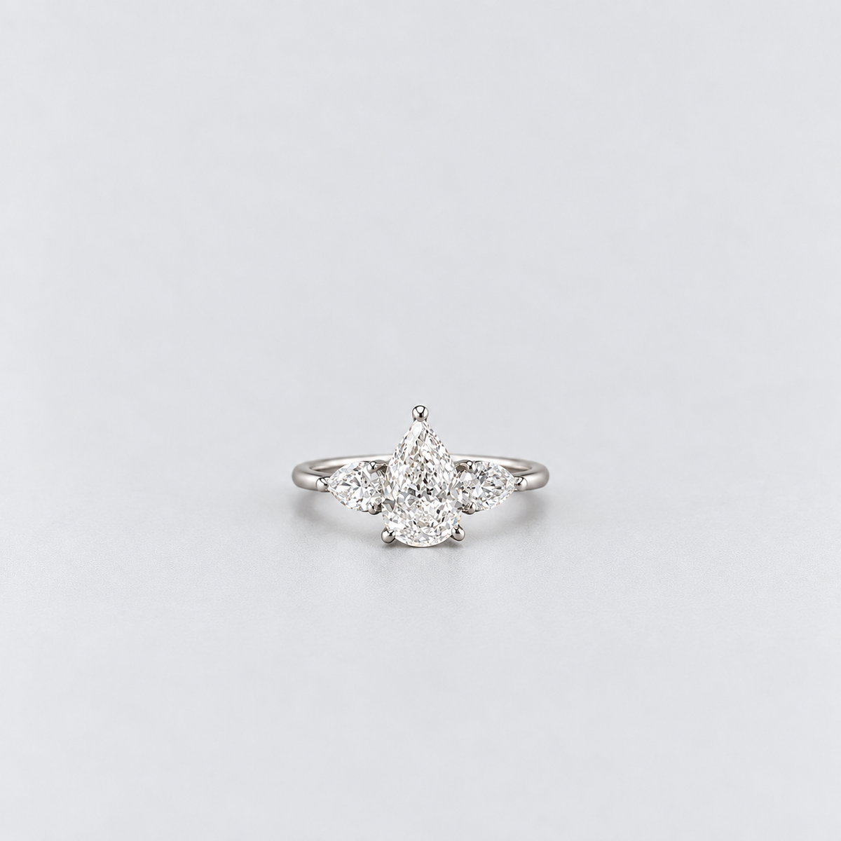 2.50 Ct. lab Grown Diamond Pear Cut Three Stone Ring (VS-EF)