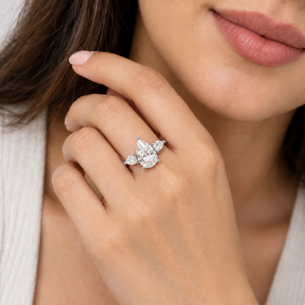 2.50 Ct. lab Grown Diamond Pear Cut Three Stone Ring (VS-EF)