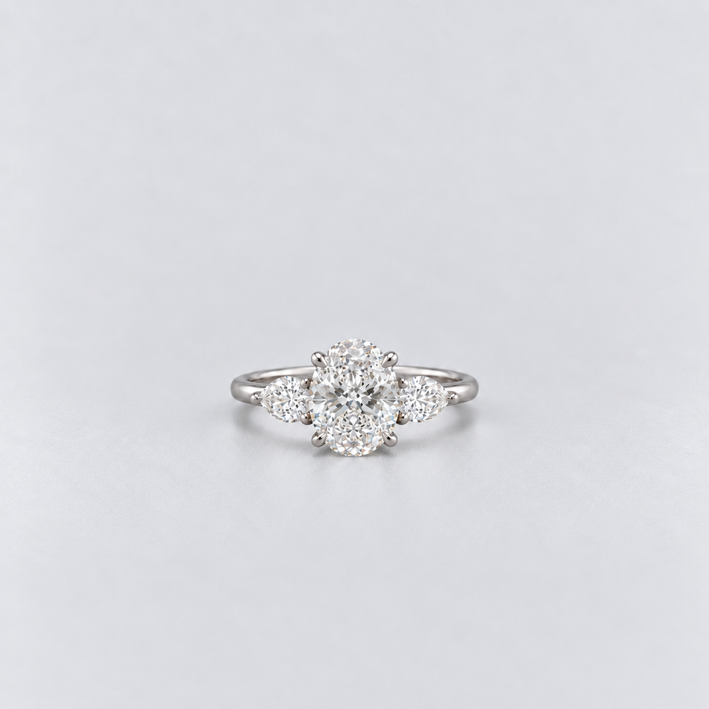 1.30 Ct. Lab Grown Diamond Oval & Pear Three Stone Ring (VS-EF)