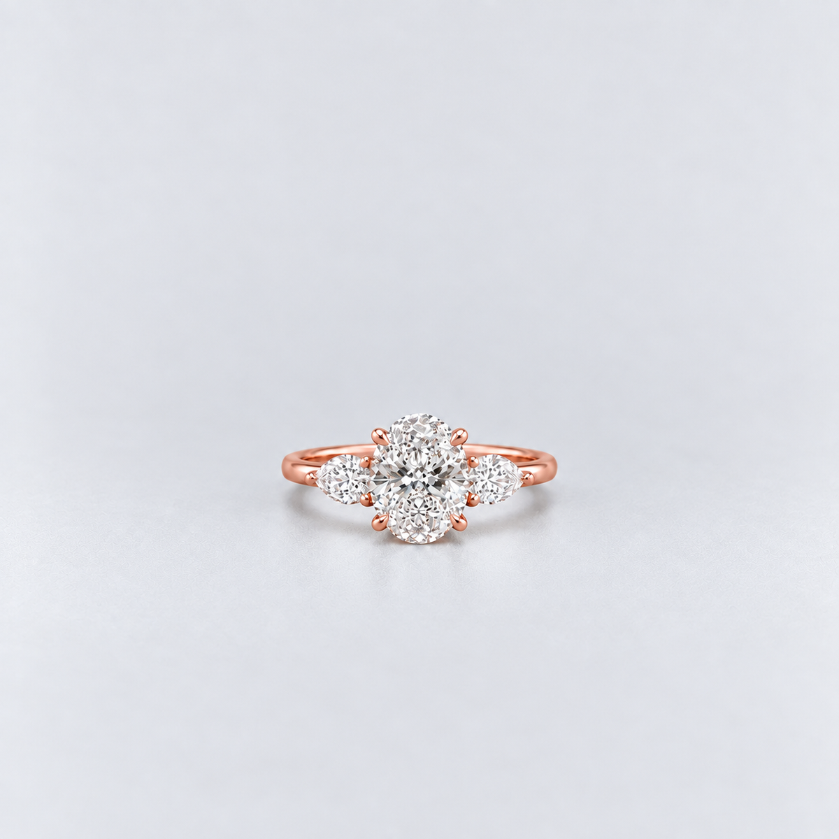 1.30 Ct. Lab Grown Diamond Oval & Pear Three Stone Ring (VS-EF)