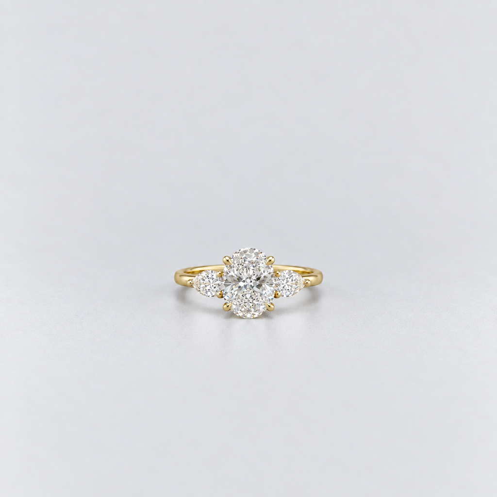 1.30 Ct. Lab Grown Diamond Oval & Pear Three Stone Ring (VS-EF)