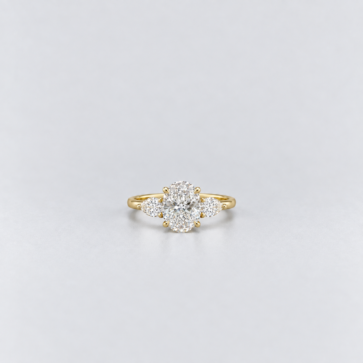 1.30 Ct. Lab Grown Diamond Oval & Pear Three Stone Ring (VS-EF)
