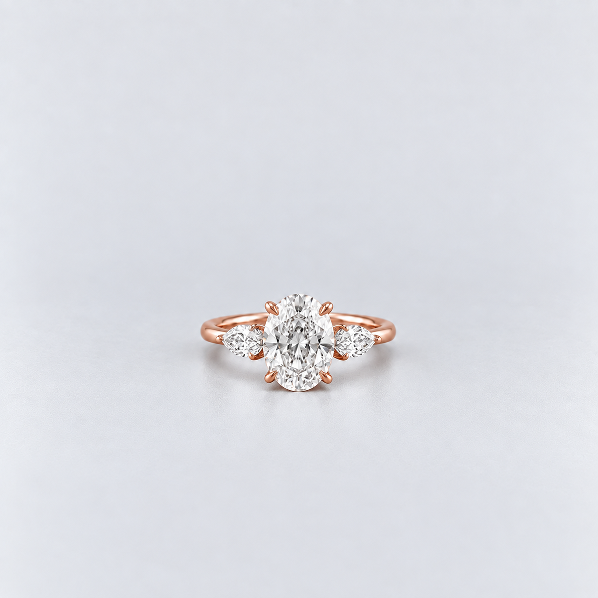 2.50 Ct. Lab Grown Diamond Oval & Pear Three Stone Ring (VS-EF)