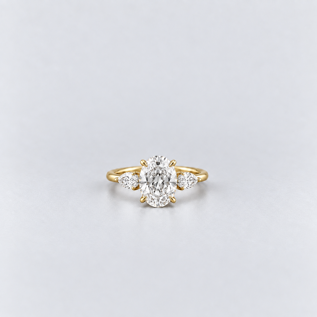 2.50 Ct. Lab Grown Diamond Oval & Pear Three Stone Ring (VS-EF)