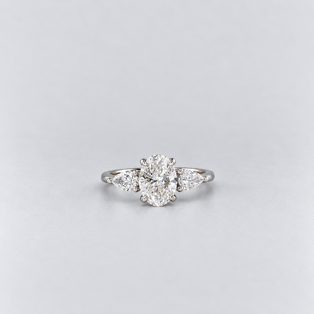 1.50 Ct. Lab Grown Diamond Three Stone Ring Oval & Pear Cut (VS-EF)