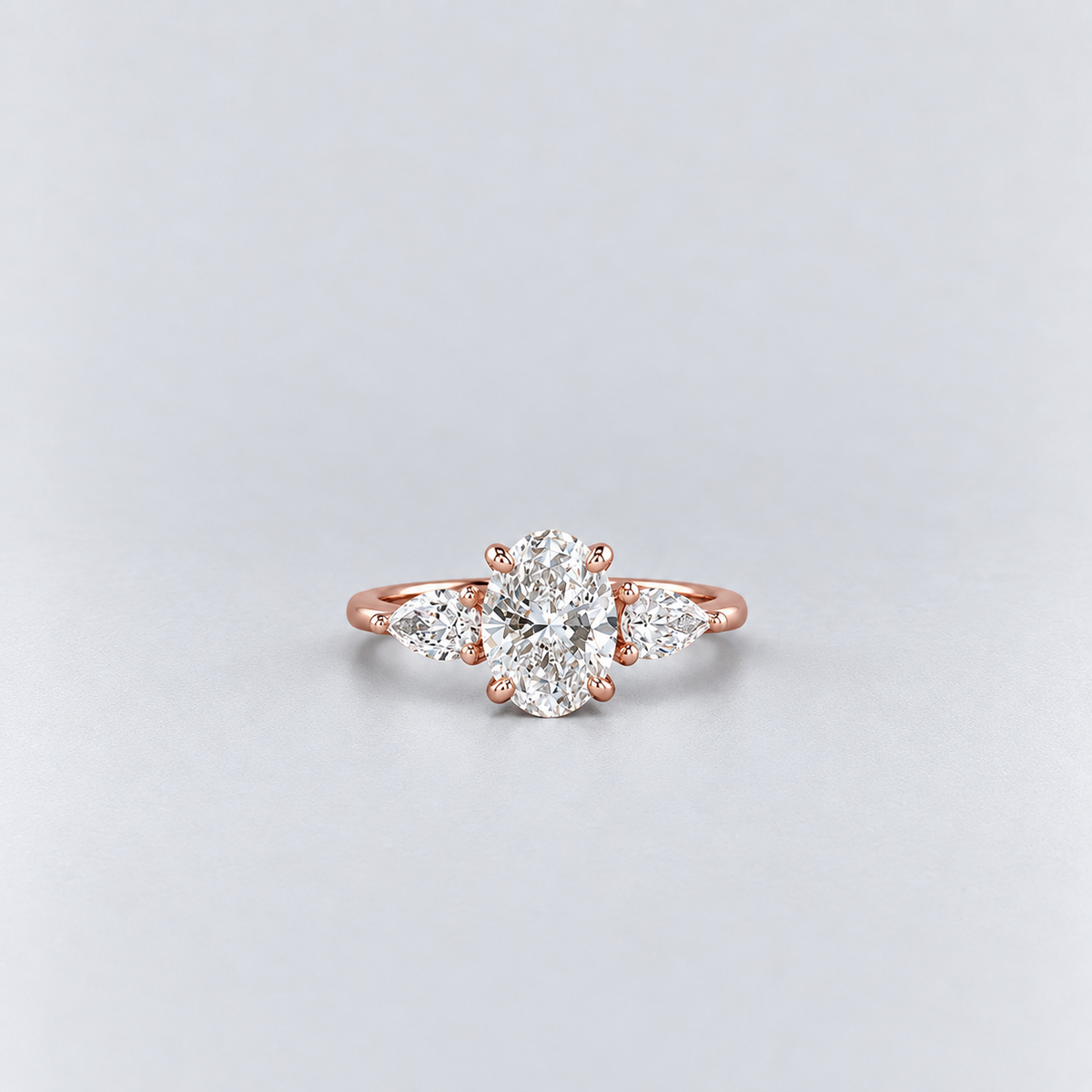 1.50 Ct. Lab Grown Diamond Three Stone Ring Oval & Pear Cut (VS-EF)