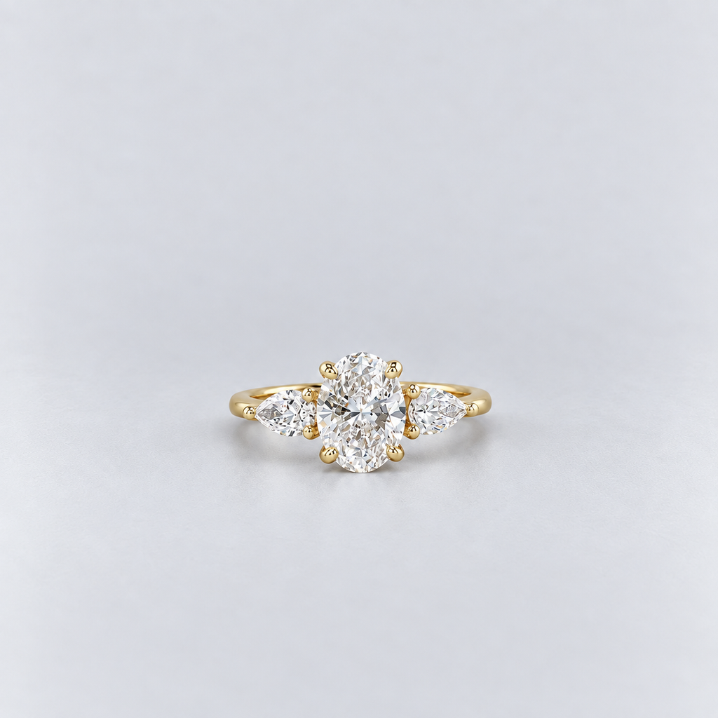 1.50 Ct. Lab Grown Diamond Three Stone Ring Oval & Pear Cut (VS-EF)
