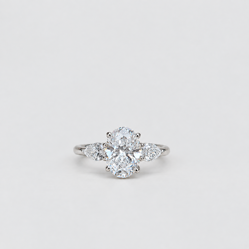1.50 Ct. Lab Grown Diamond Three Stone Ring Oval & Pear (VS-EF)
