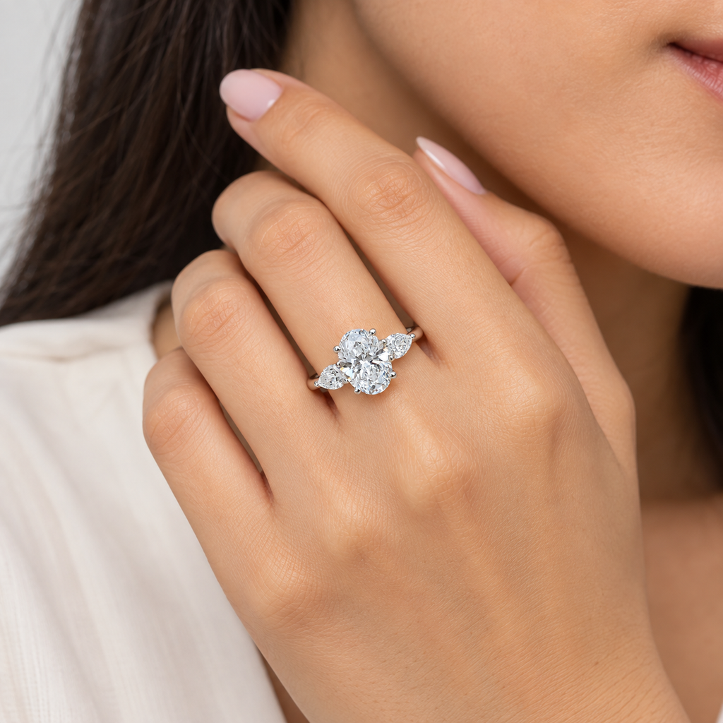 1.50 Ct. Lab Grown Diamond Three Stone Ring Oval & Pear (VS-EF)