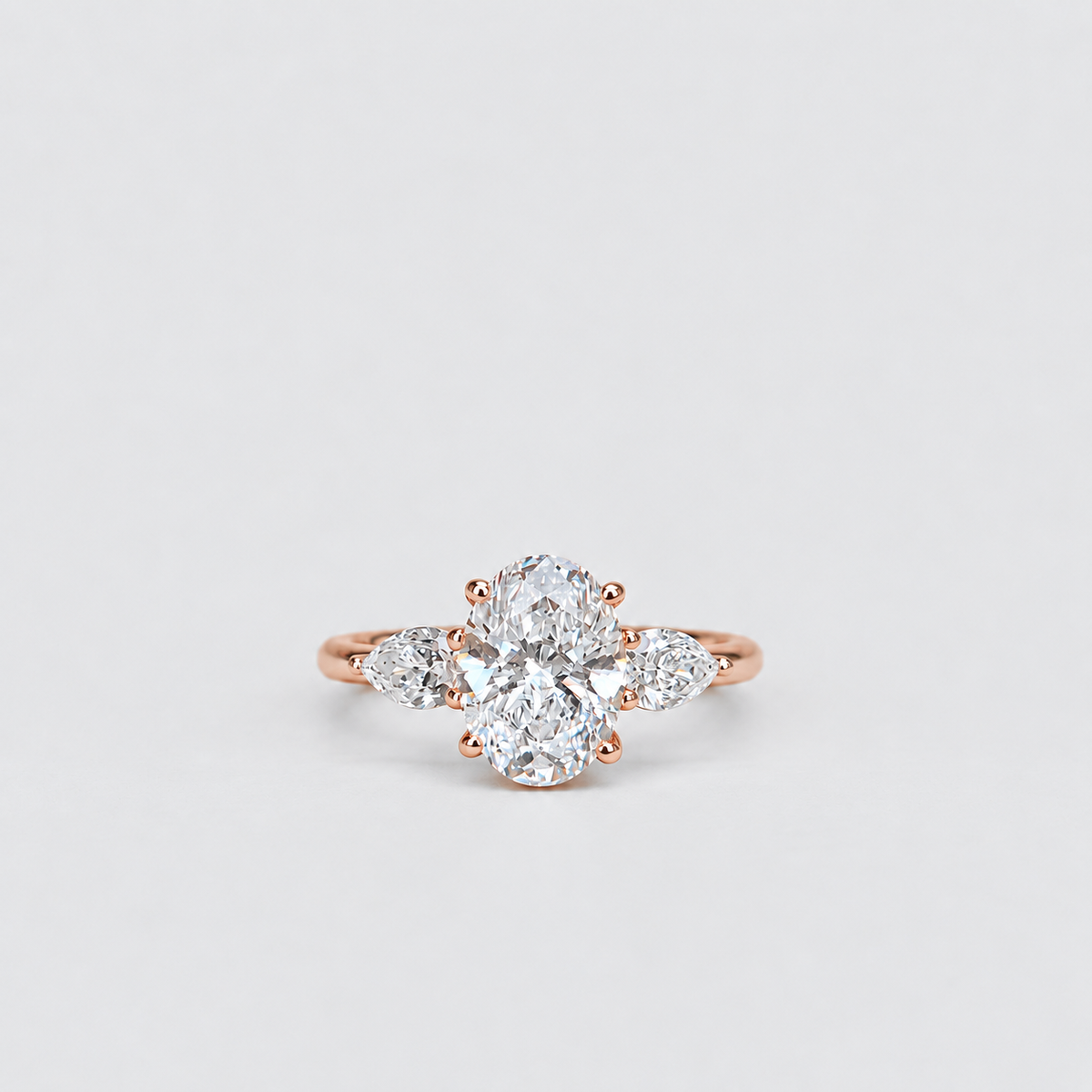 1.50 Ct. Lab Grown Diamond Three Stone Ring Oval & Pear (VS-EF)