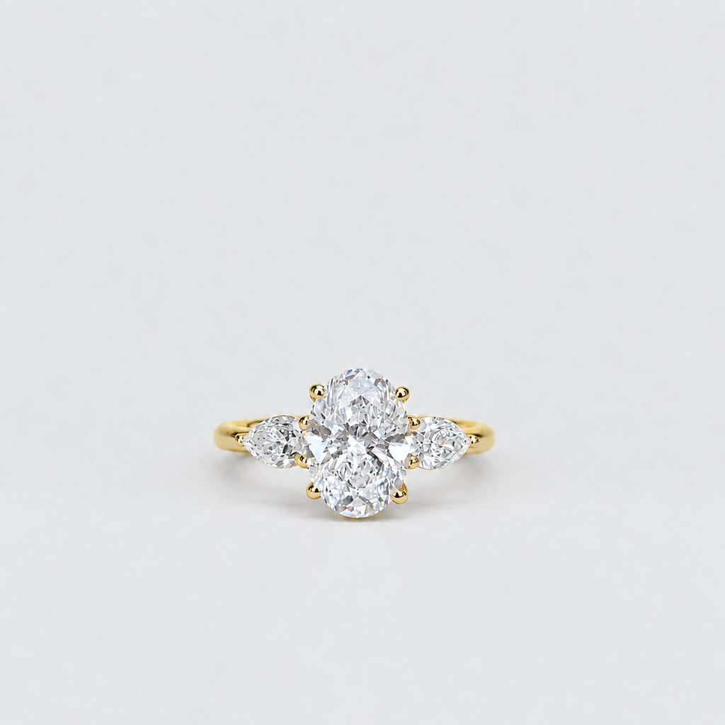 1.50 Ct. Lab Grown Diamond Three Stone Ring Oval & Pear (VS-EF)