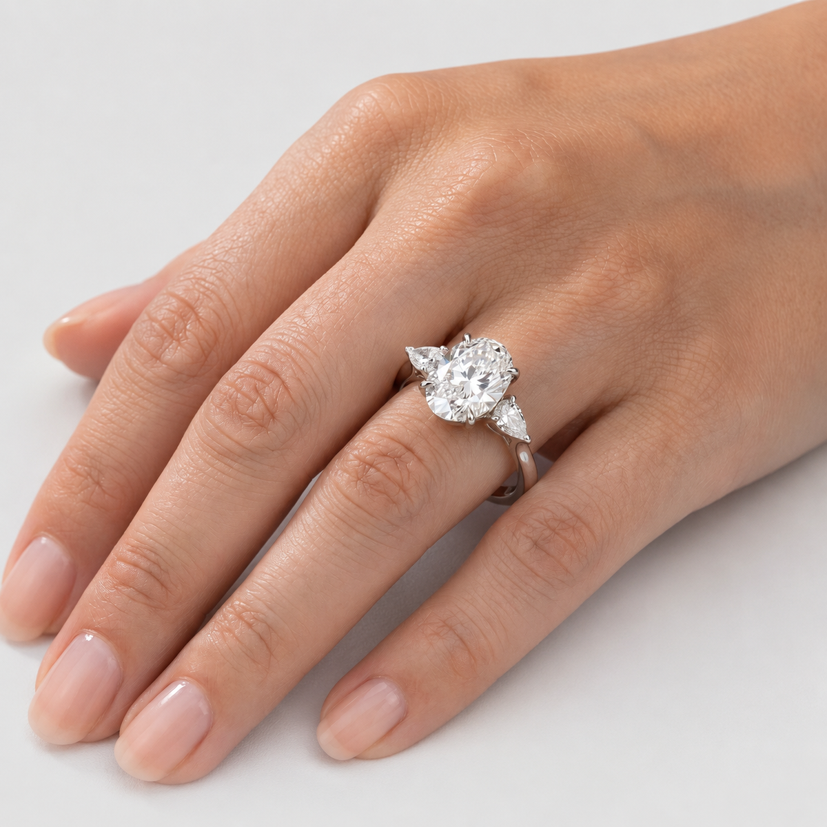 2.5 Ct. Lab-Grown Diamond Three Stone Ring Oval Cut (VS-EF)