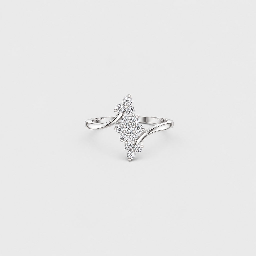 A silver ring featuring a central diamond-shaped cluster of small clear stones, with curved silver bands extending from the sides, shown on a light gray background.