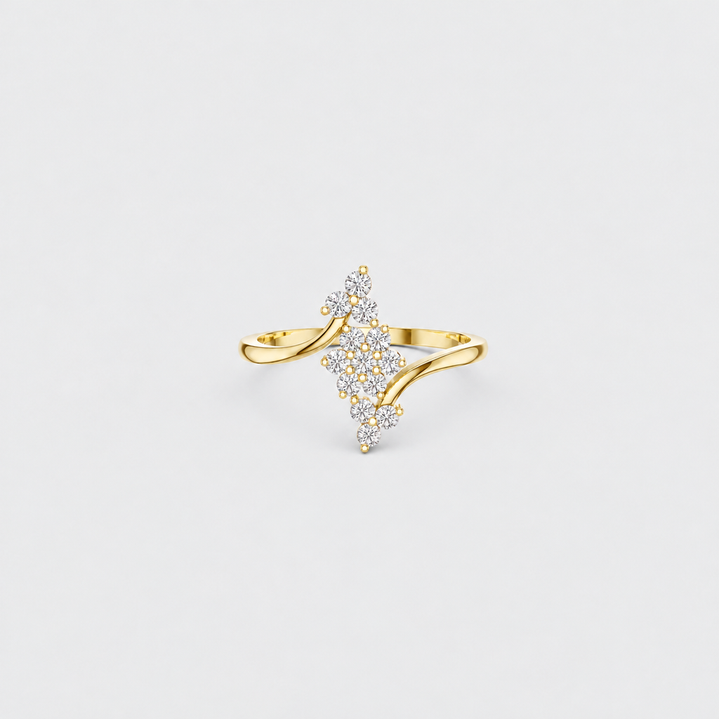 A gold ring featuring a central diamond-shaped cluster of small clear stones, set on a smooth curved gold band, photographed against a light gray background.