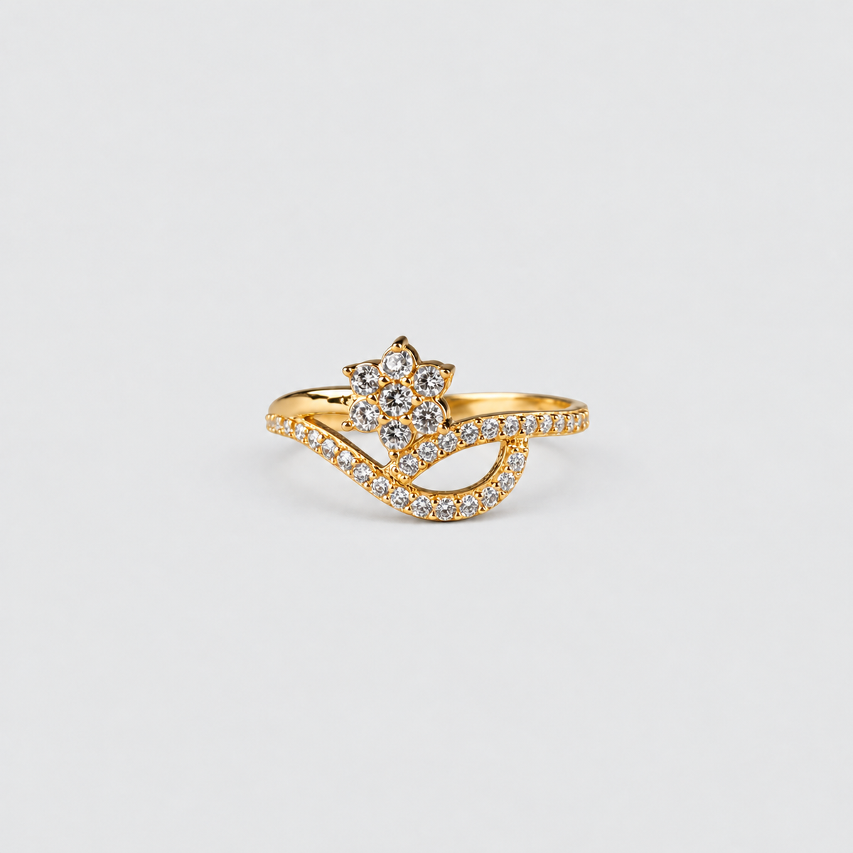 Gold ring on a white background