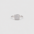 A silver square pavé ring with a pave-set diamond center and a slim band, shown on a light gray background.