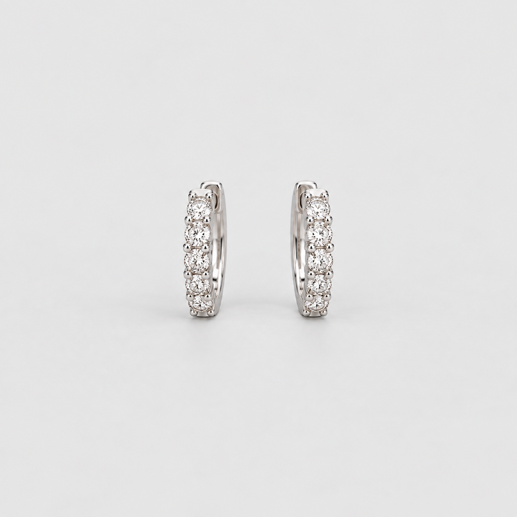 Lab grown diamond huggie hoop earrings in white gold with five round cut diamonds each, front view