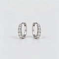 14K white gold lab grown diamond huggie hoop earrings with five round cut diamonds each, angled view