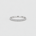 A thin silver diamond band ring with a row of small round-cut diamonds set on a plain light gray background.