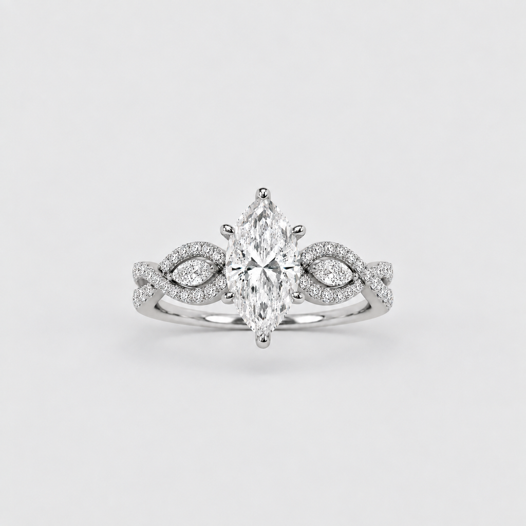 A silver-tone marquise-cut diamond engagement ring with pavé-set diamonds on the band, centered on a light gray background.