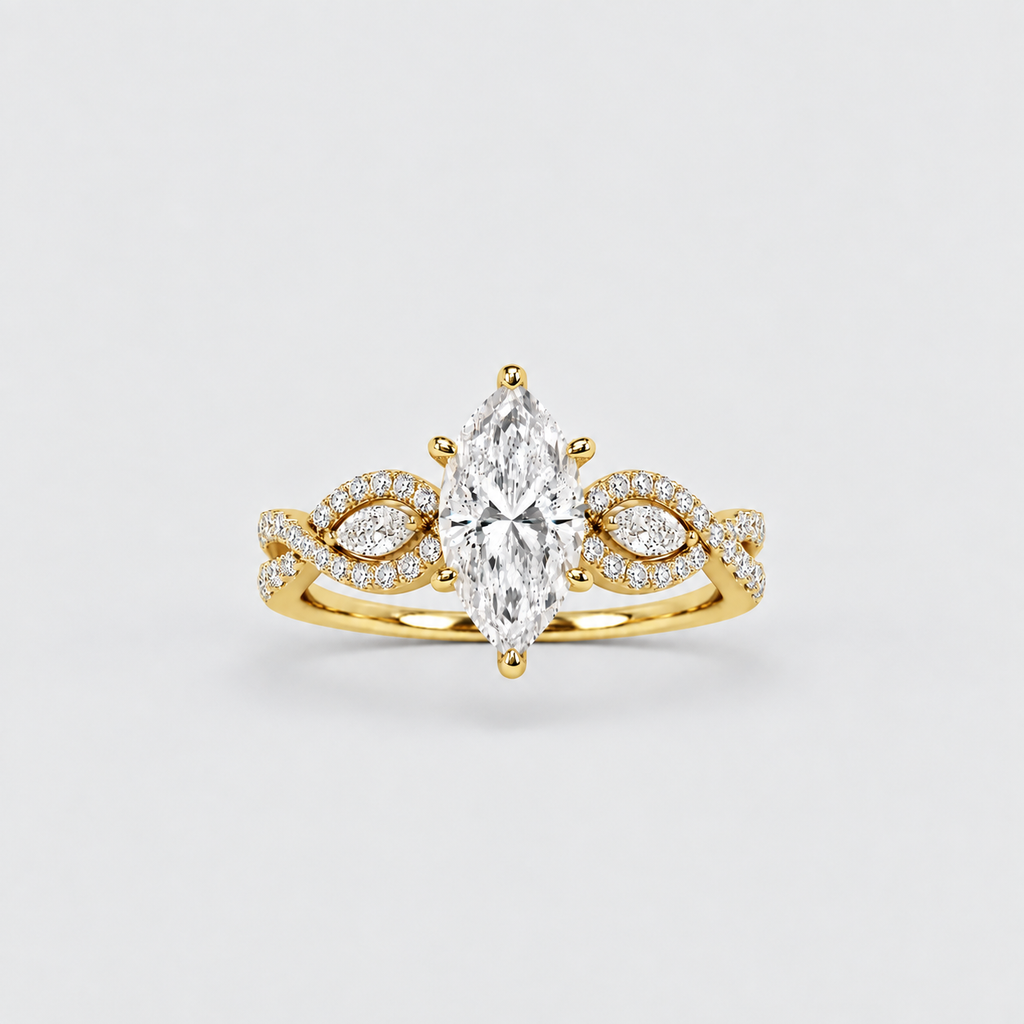 A yellow gold marquise-cut diamond ring with a halo of small diamonds on the band and matching diamond accents on the shoulders, centered on a light gray background.