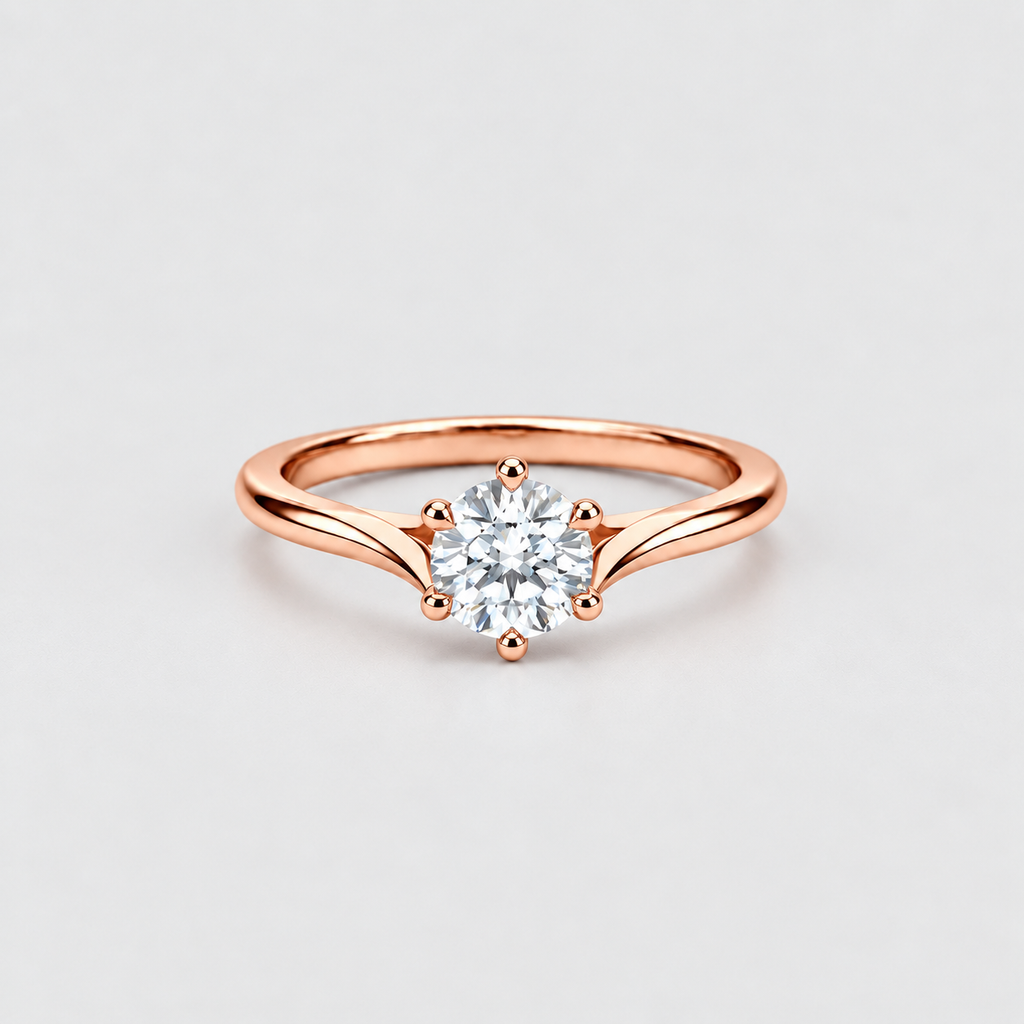 A rose gold solitaire engagement ring with a round brilliant-cut diamond set in a six-prong setting, shown on a clean light gray background.