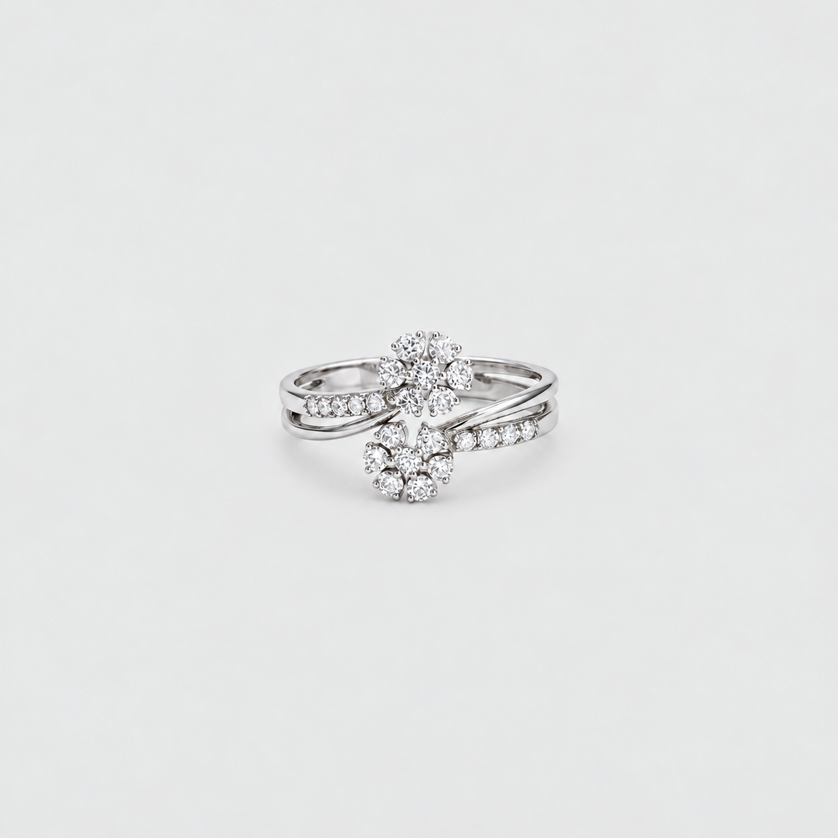 Women's diamond cluster ring set in white gold