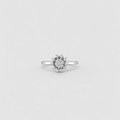 Women's white gold diamond cluster ring with a split shank band