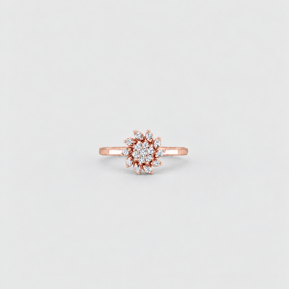 Rose gold diamond cluster ring in a floral pattern