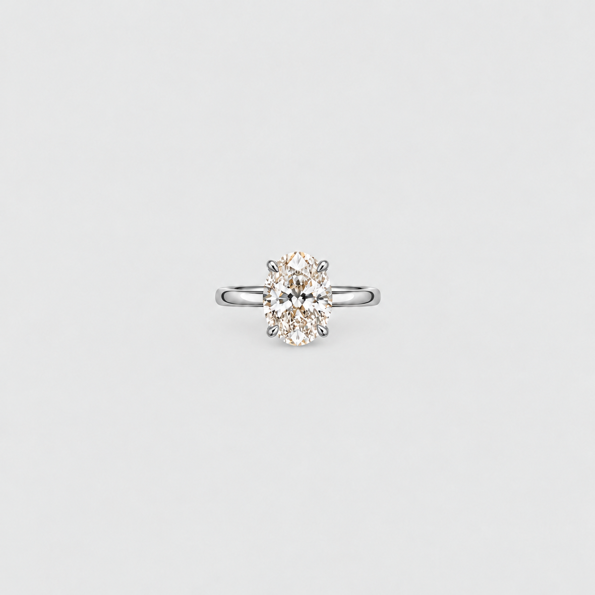 Oval cut diamond solitaire engagement ring in white gold