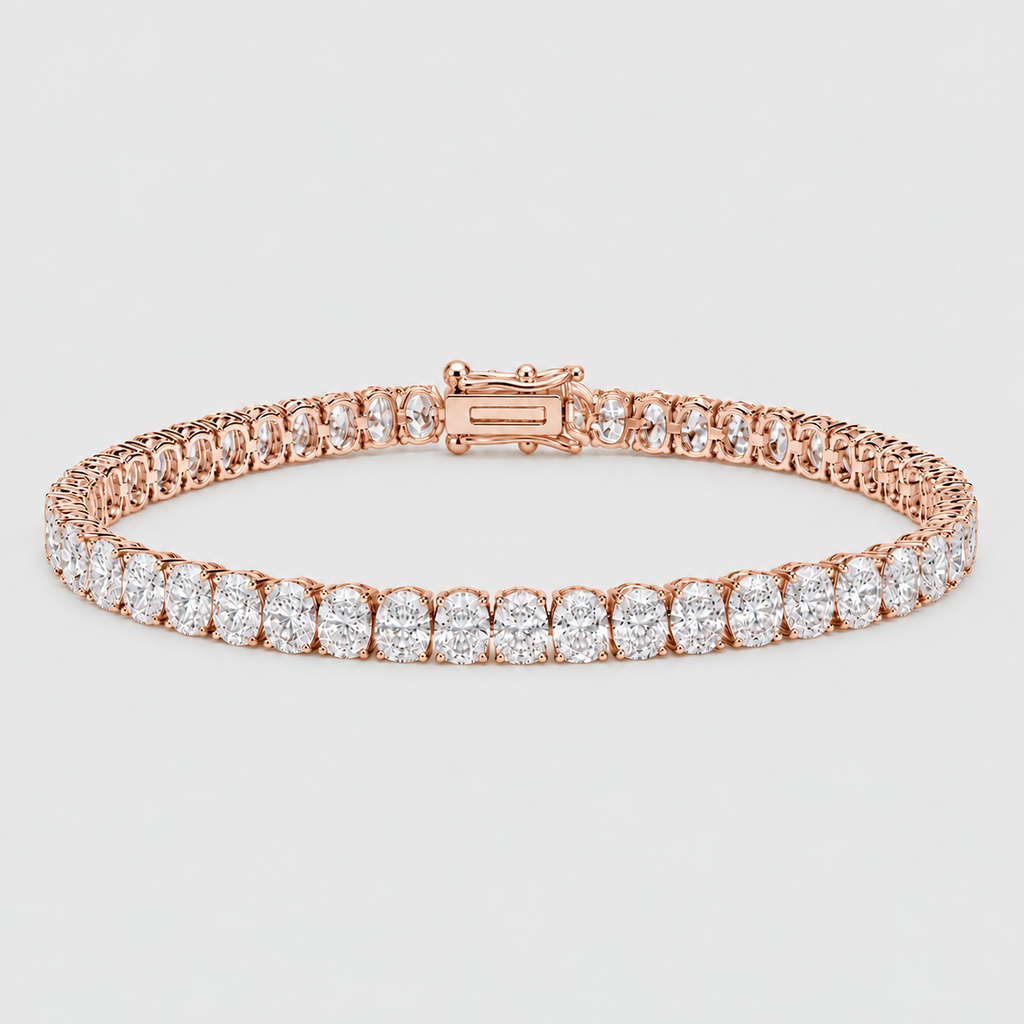 A rose gold tennis bracelet featuring a row of round-cut clear gemstones, displayed on a light gray background.