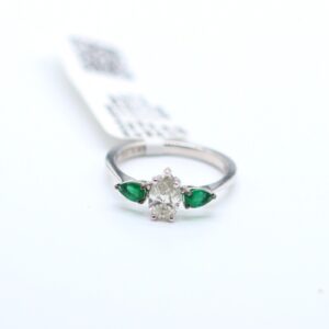 1.40 ct Pear Cut Lab Grown Diamond and Emerald Ring